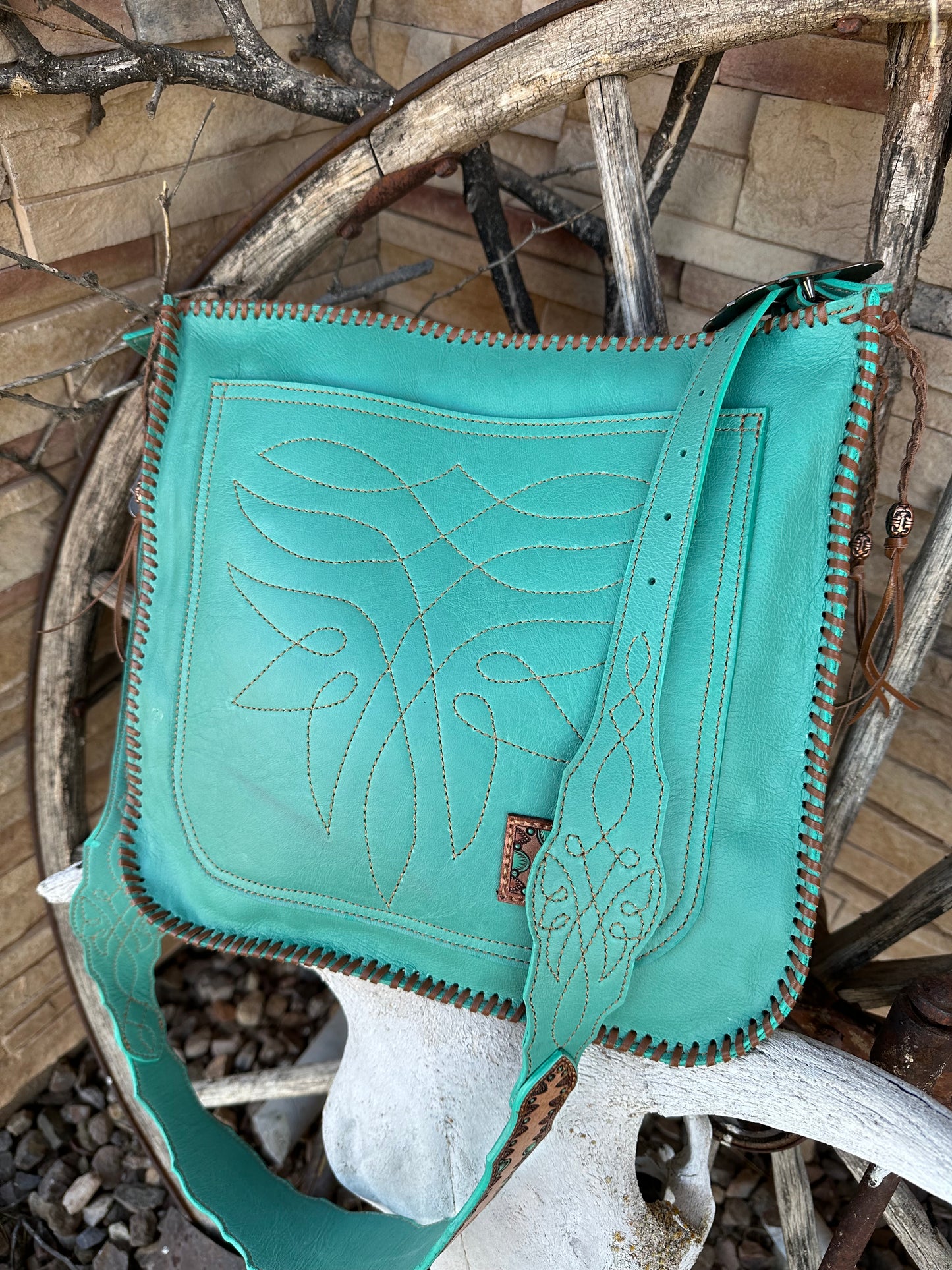 Western tooled leather floral chaps fringe bag