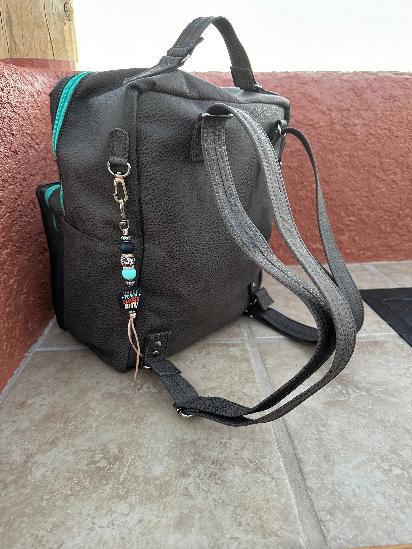 Western tooled leather Cowboy Tears and chocolate leather backpack