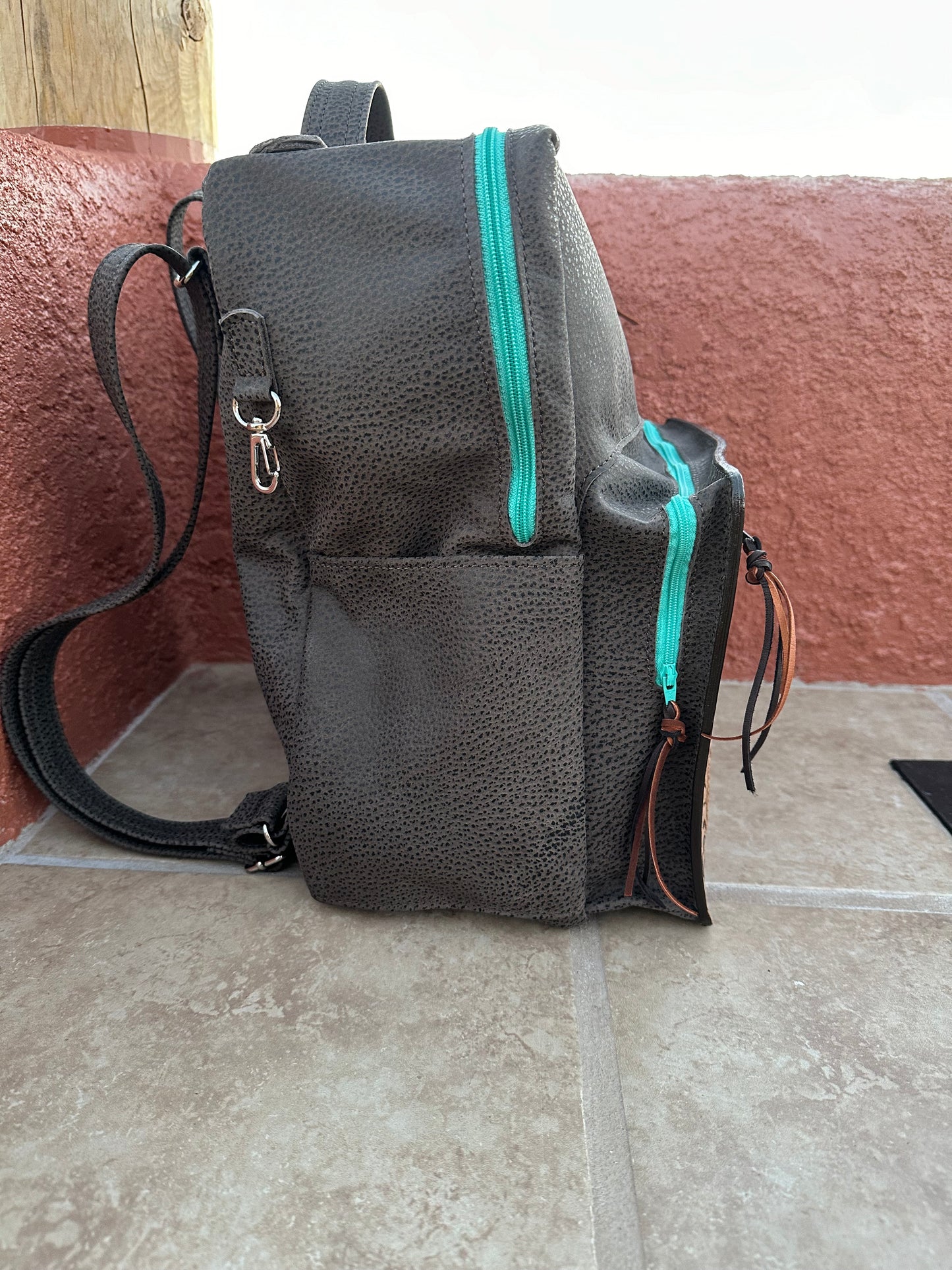 Western tooled leather Cowboy Tears and chocolate leather backpack