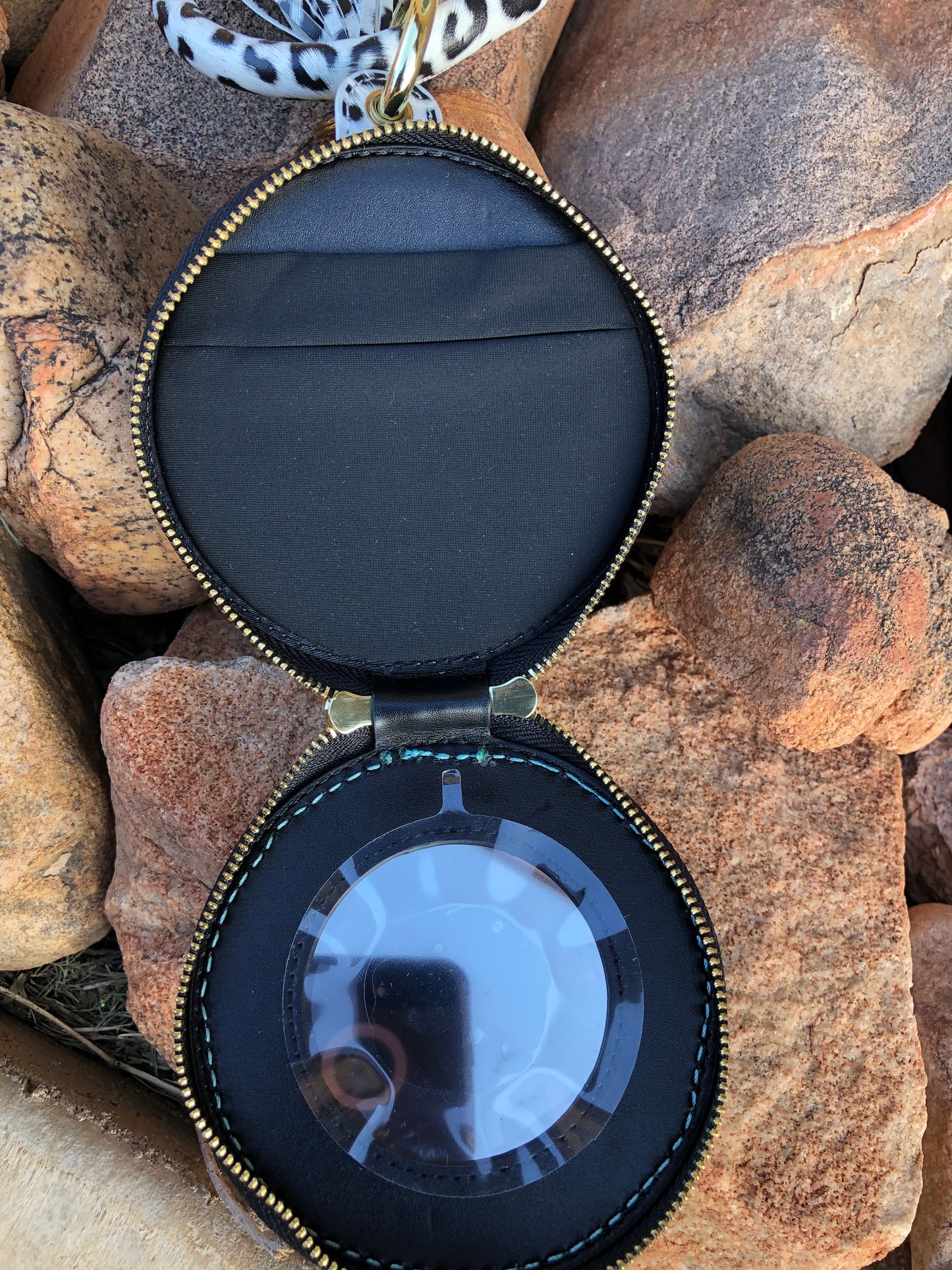 Western tooled leather floral and geometric snow leopard wristlet with mirror