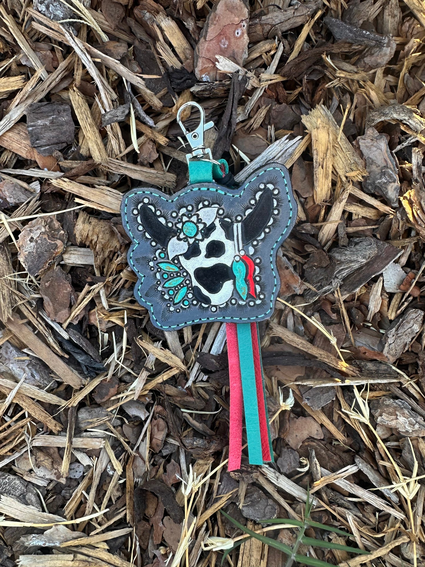 Western tooled leather feathered cow and turquoise keychain