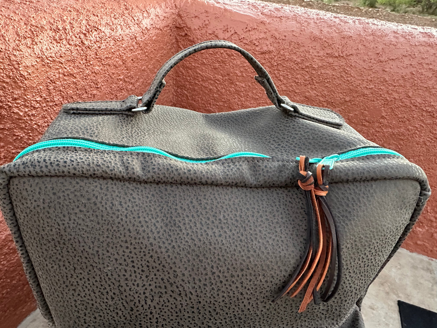 Western tooled leather Cowboy Tears and chocolate leather backpack