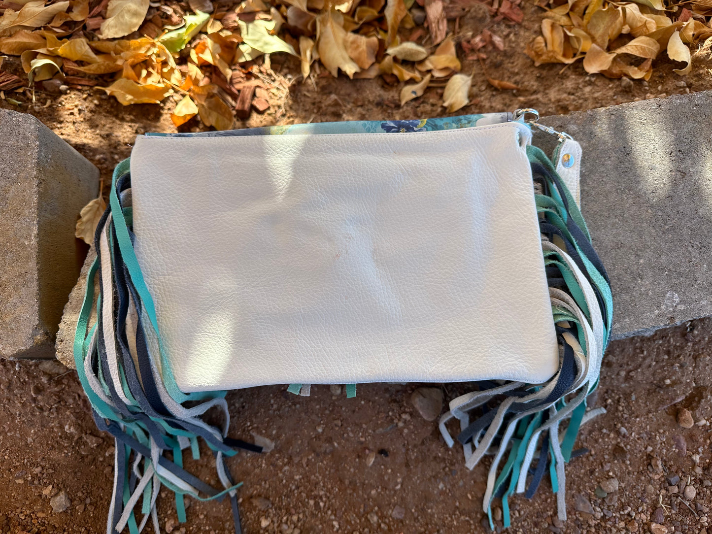 Western printed leather fringe clutch