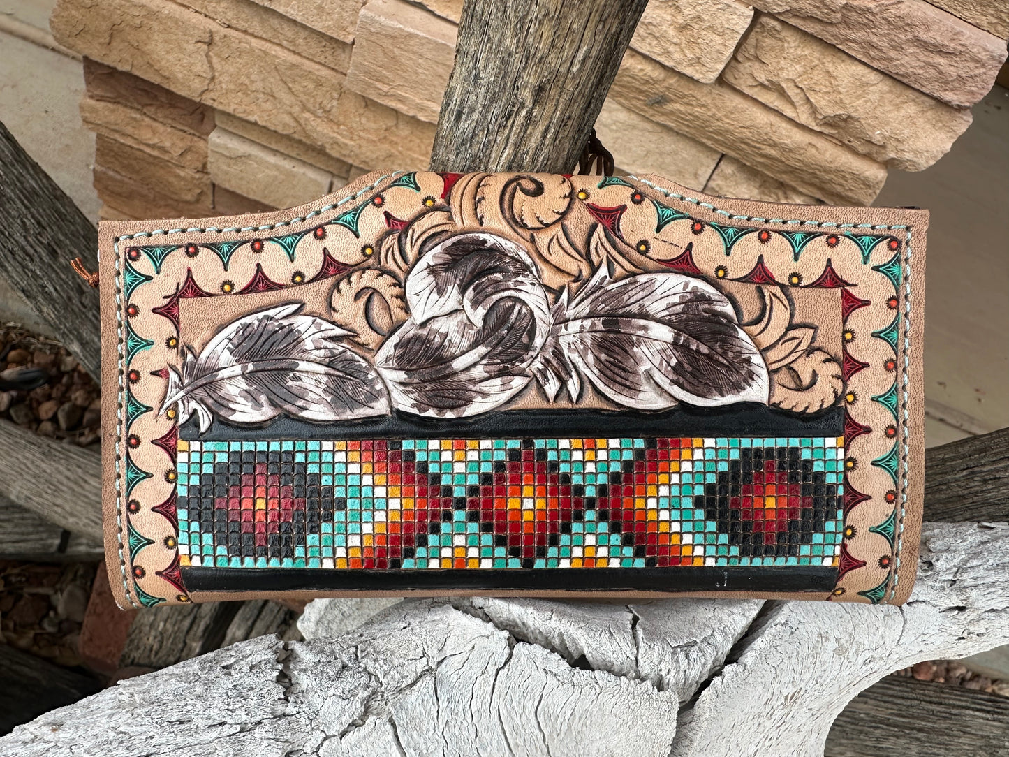 Southwest tooled leather feather and faux beadwork wallet