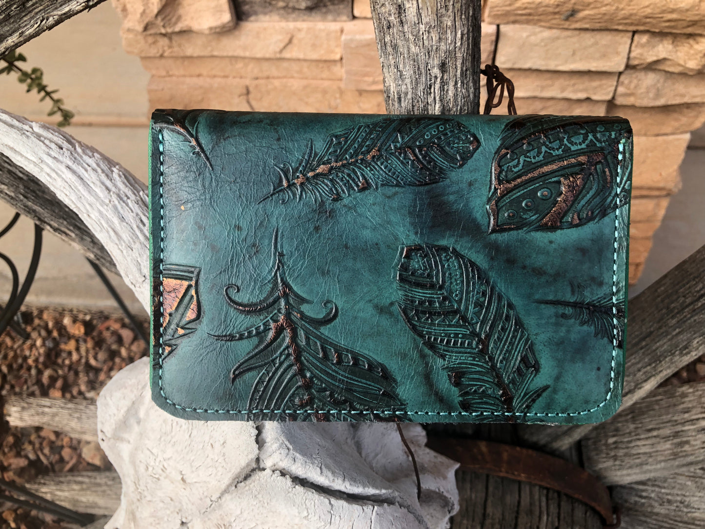 Western tooled leather floral and squash blossom patch on embossed feather leather manicure kit