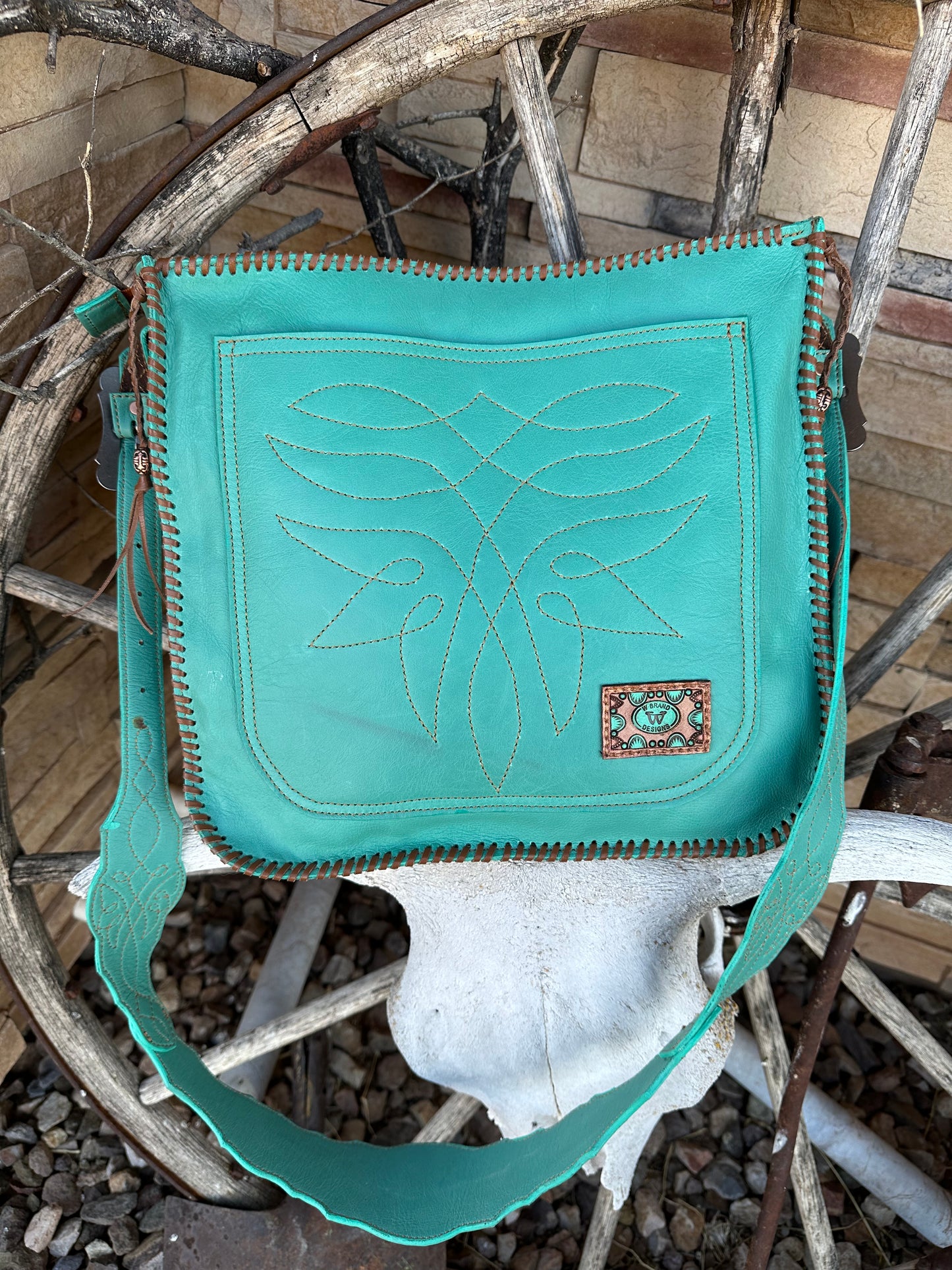 Western tooled leather floral chaps fringe bag