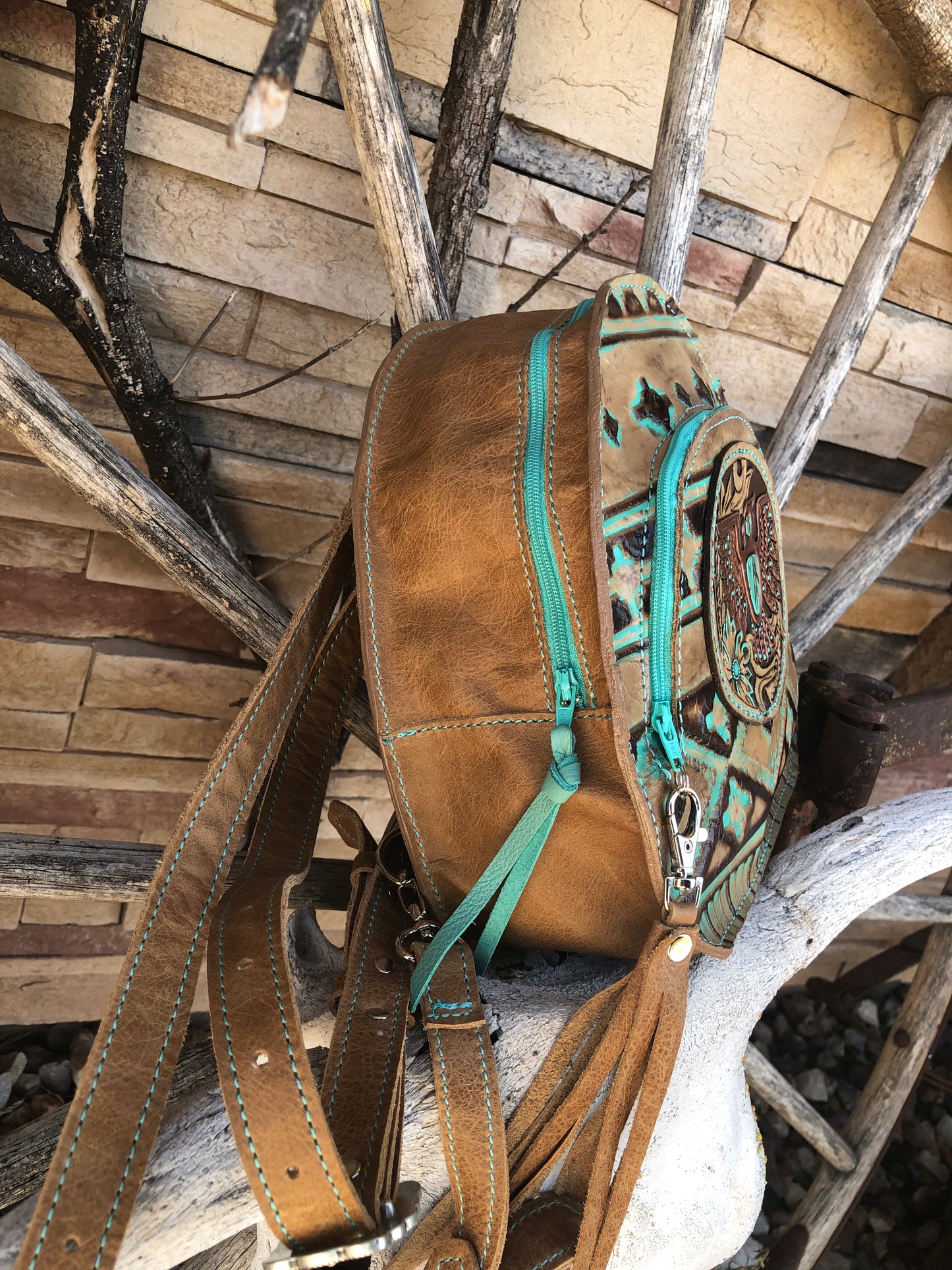 Southwestern tooled leather thunderbird patch backpack purse.