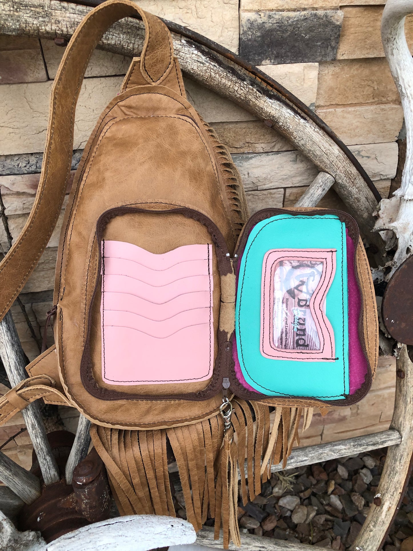 Small Southwestern tooled leather floral fringe sling bag
