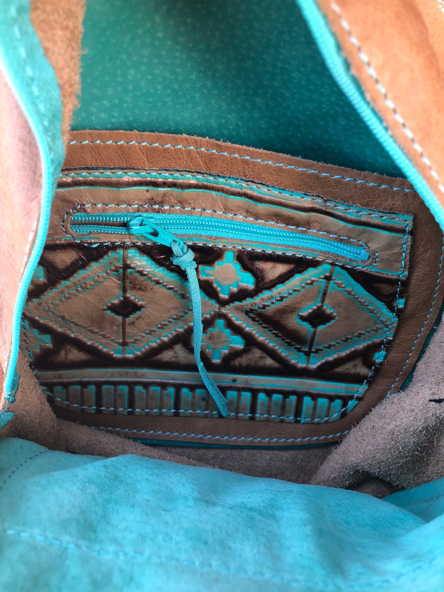 Southwestern tooled leather thunderbird patch backpack purse.