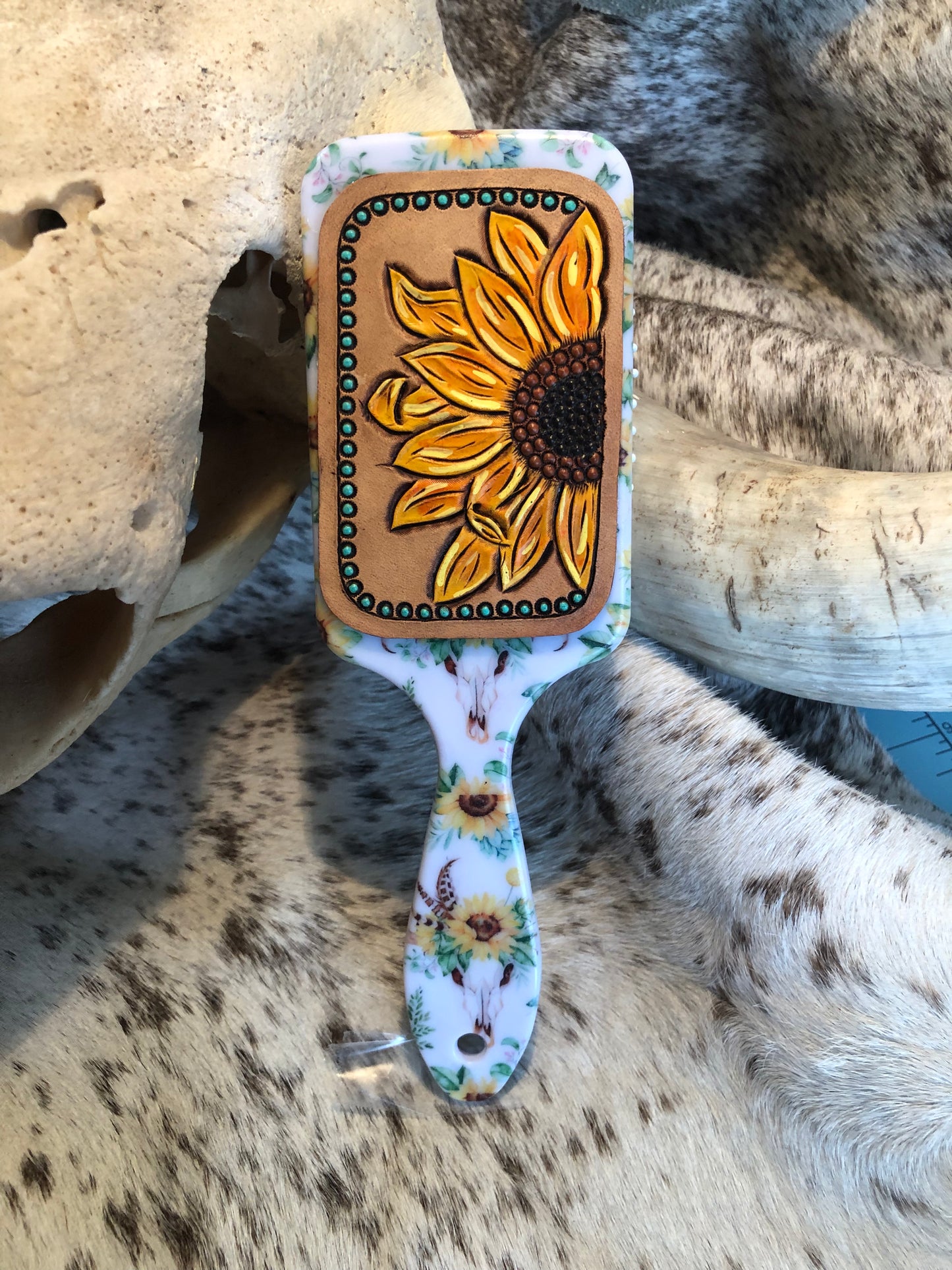 Western tooled leather sunflower patch on sunflower cow skull print paddle brush