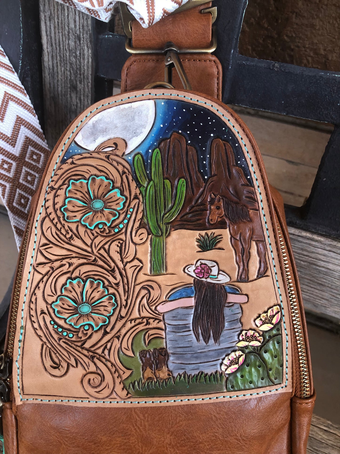 Western tooled leather desert night dip sling bag