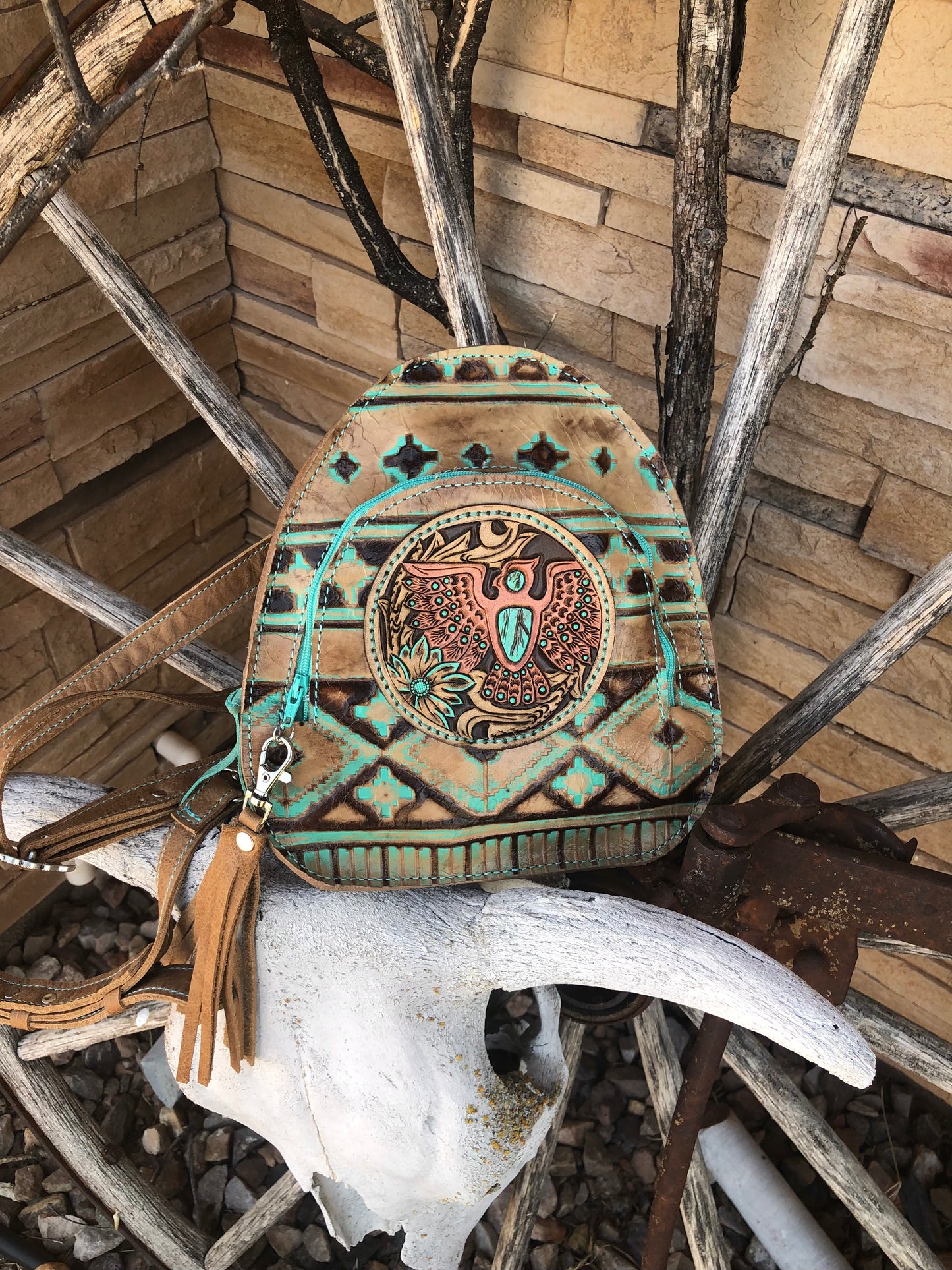 Southwestern tooled leather thunderbird patch backpack purse.