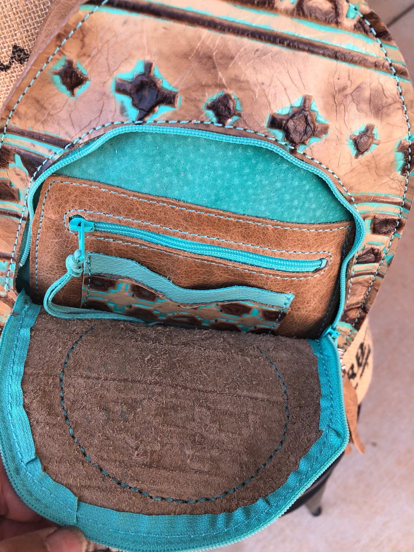 Southwestern tooled leather thunderbird patch backpack purse.