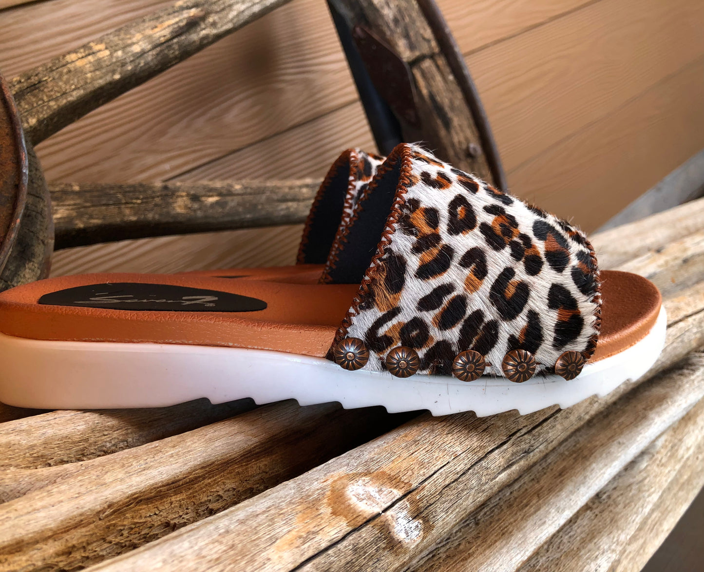 Women’s size 8 leopard print hair on hide slides