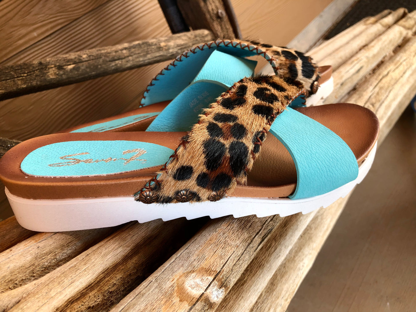 Women’s size 10 turquoise and leopard print hair on hide sandals