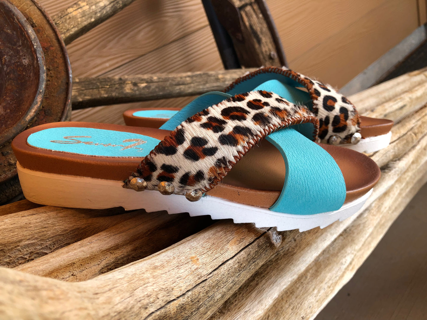Women’s size 7 turquoise and leopard print hair on hide sandals