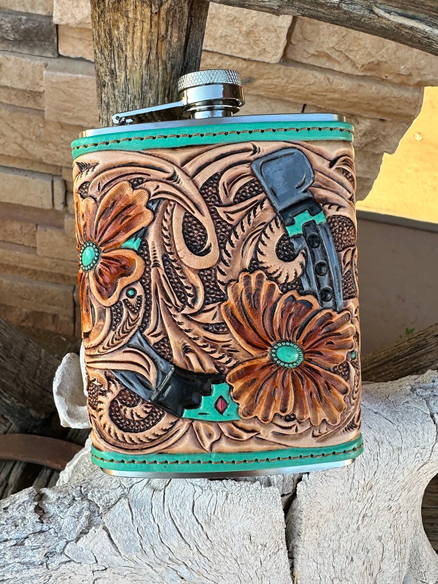 Western tooled leather floral horseshoe flask