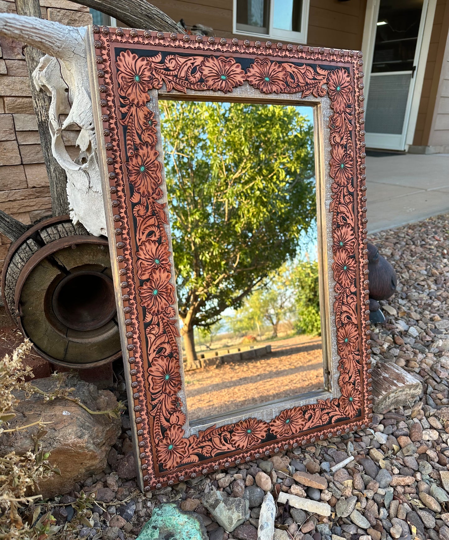 Western tooled floral mirror