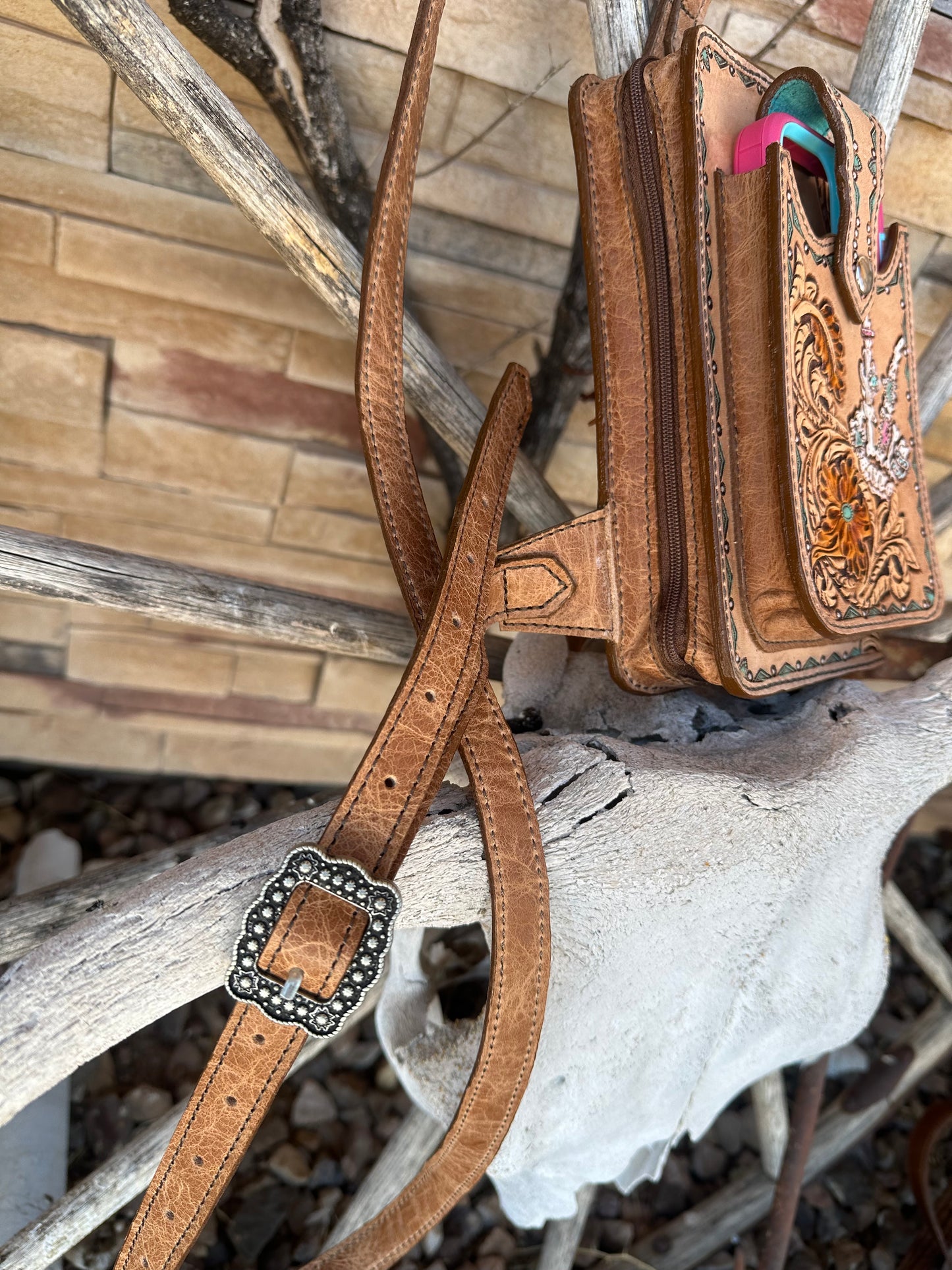 Western tooled leather skeleton hand and floral cell phone sling wallet