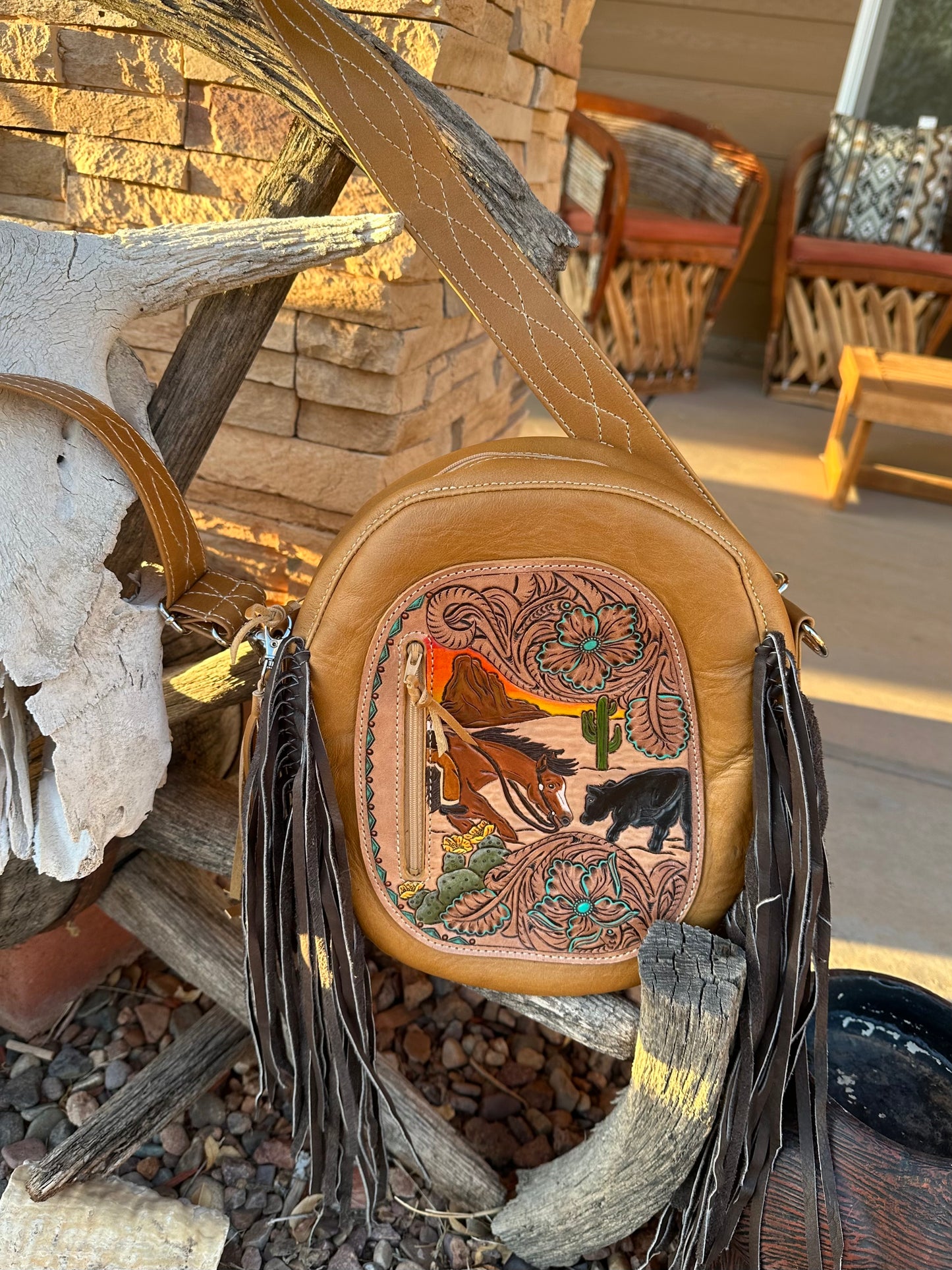 Western tooled leather cutter bag