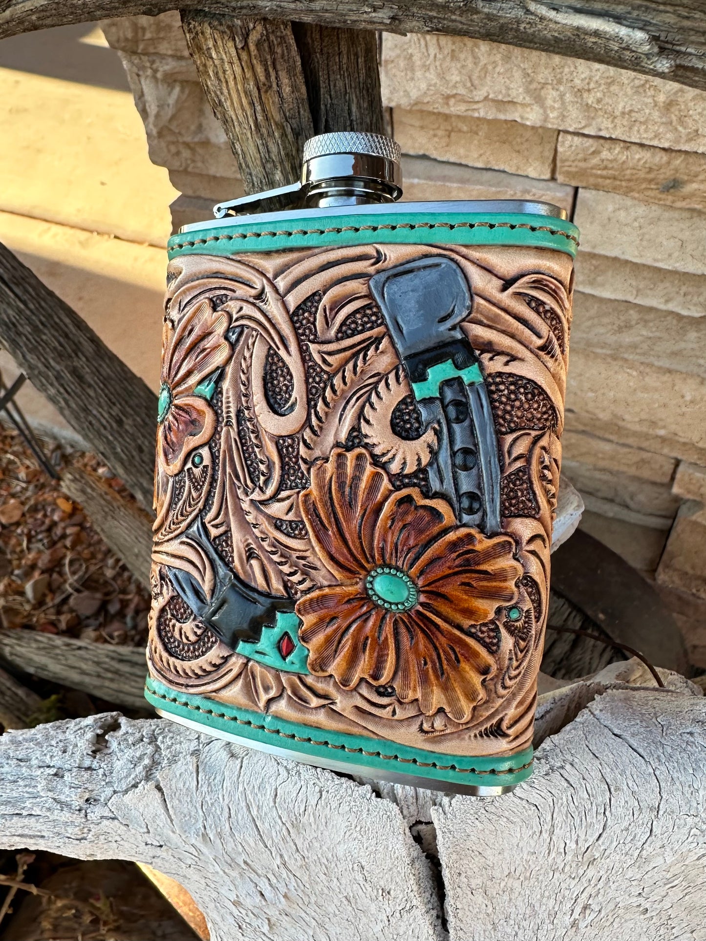 Western tooled leather floral horseshoe flask