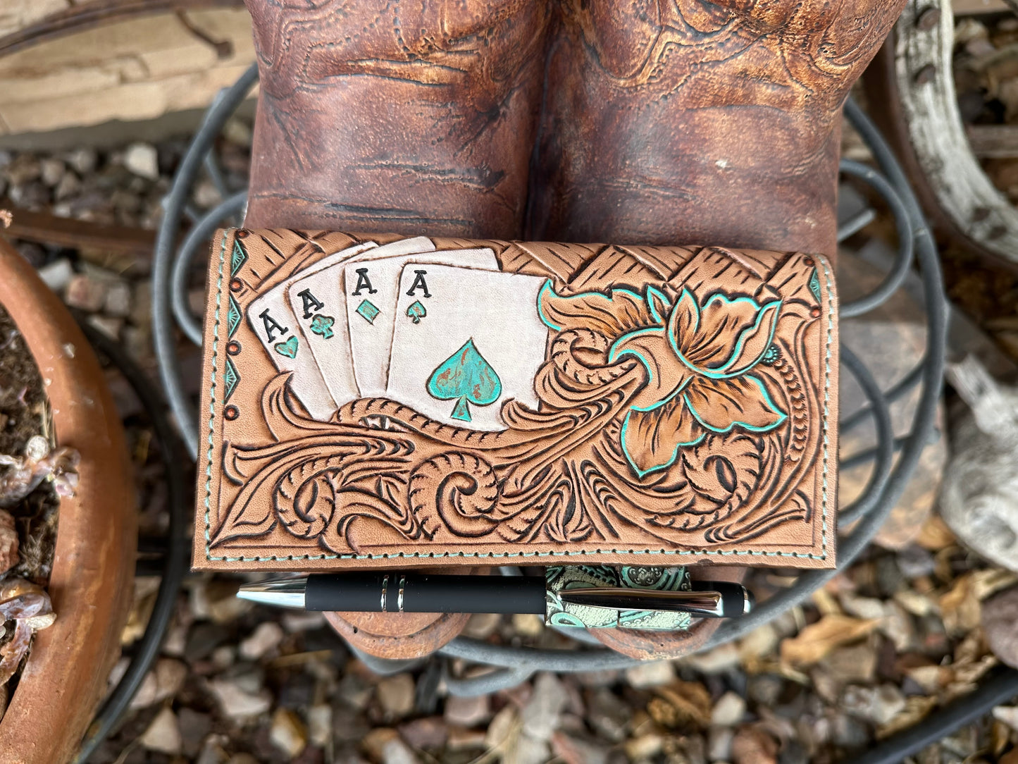 Western tooled leather cards and floral checkbook cover