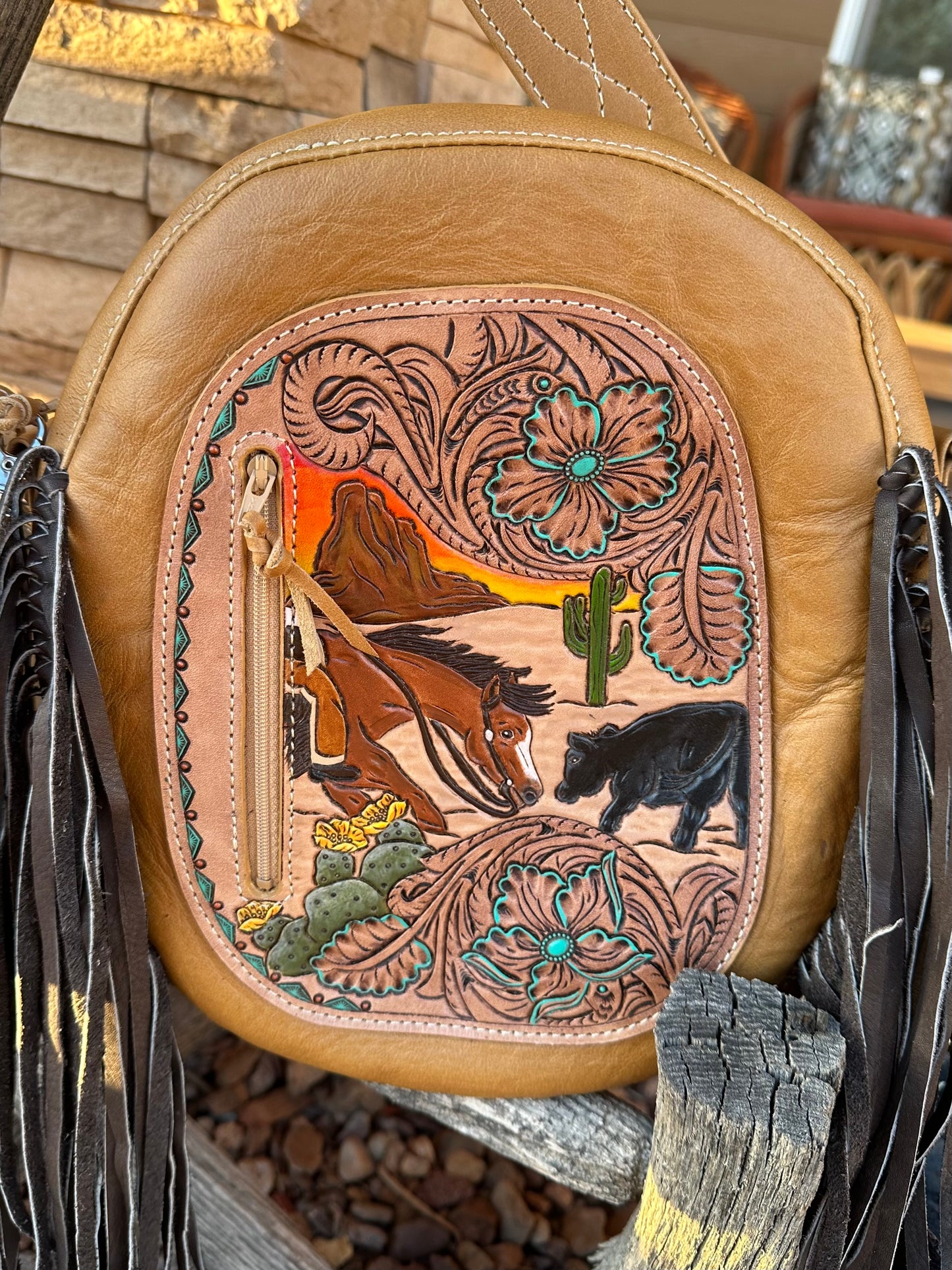 Western tooled leather cutter bag