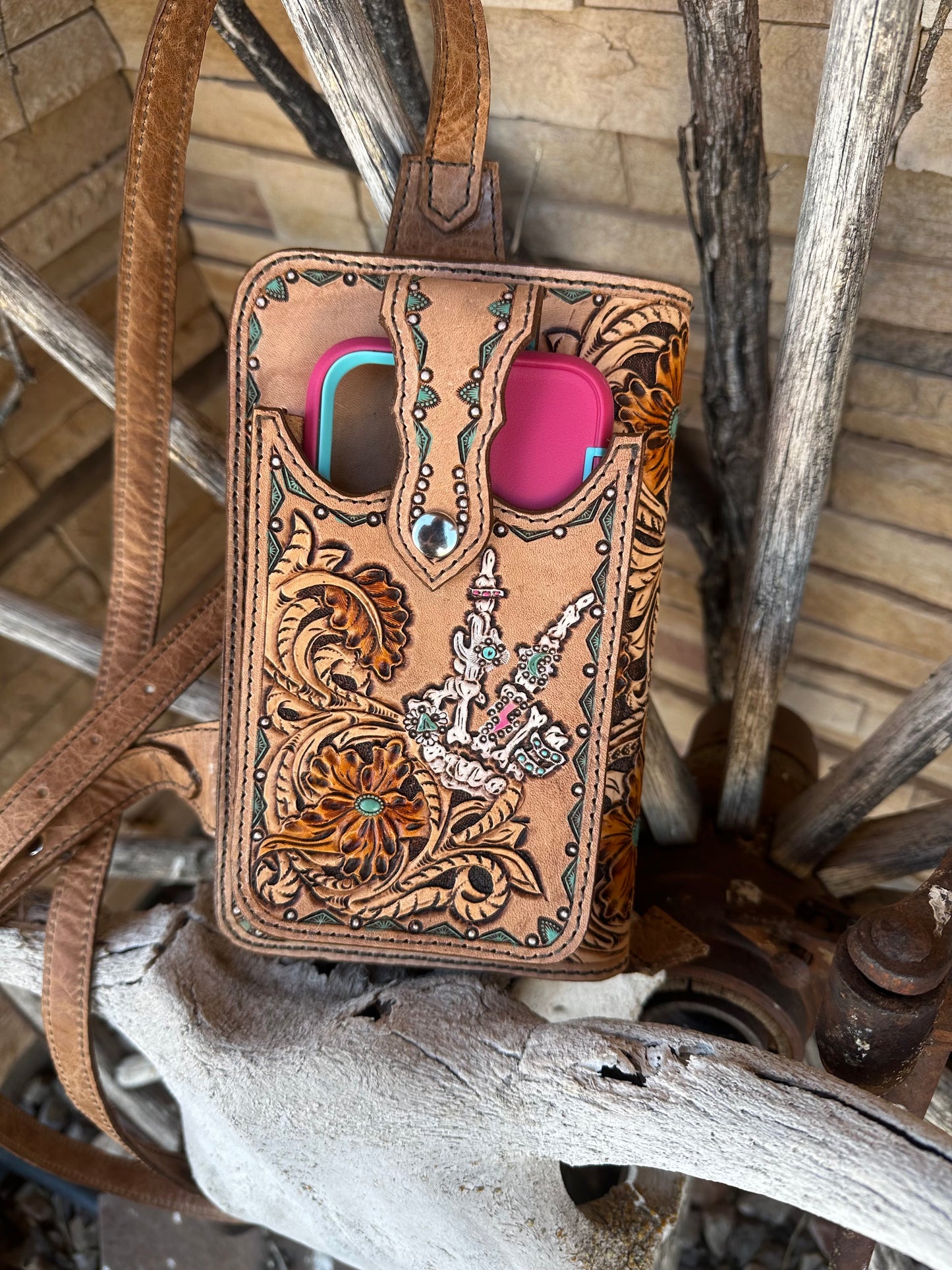 Western tooled leather skeleton hand and floral cell phone sling wallet