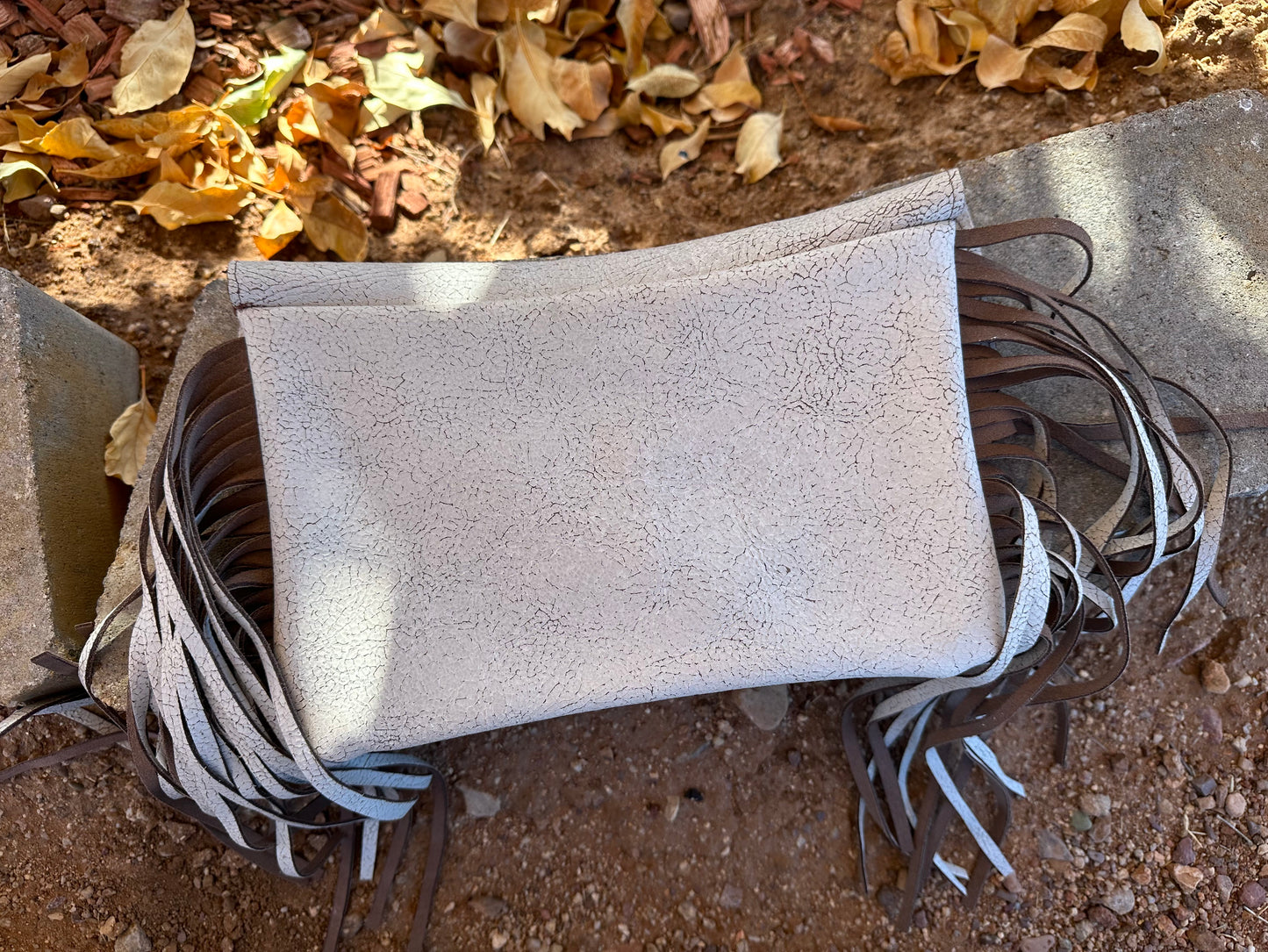 Western white cracked leather fringe clutch