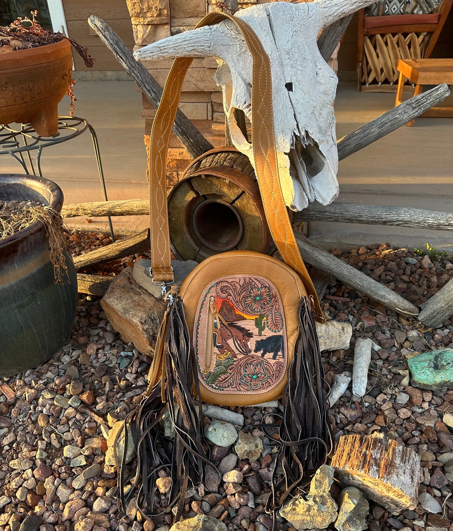 Western tooled leather cutter bag