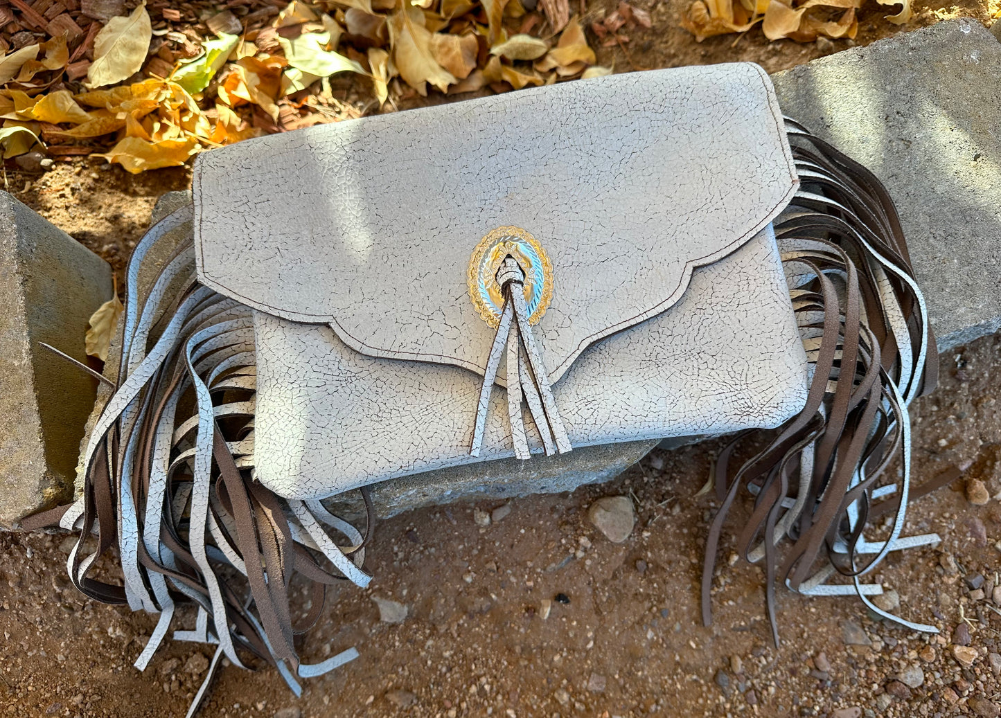 Western white cracked leather fringe clutch