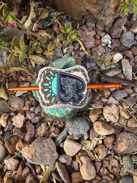 Western tooled leather spade and turquoise stick barrette