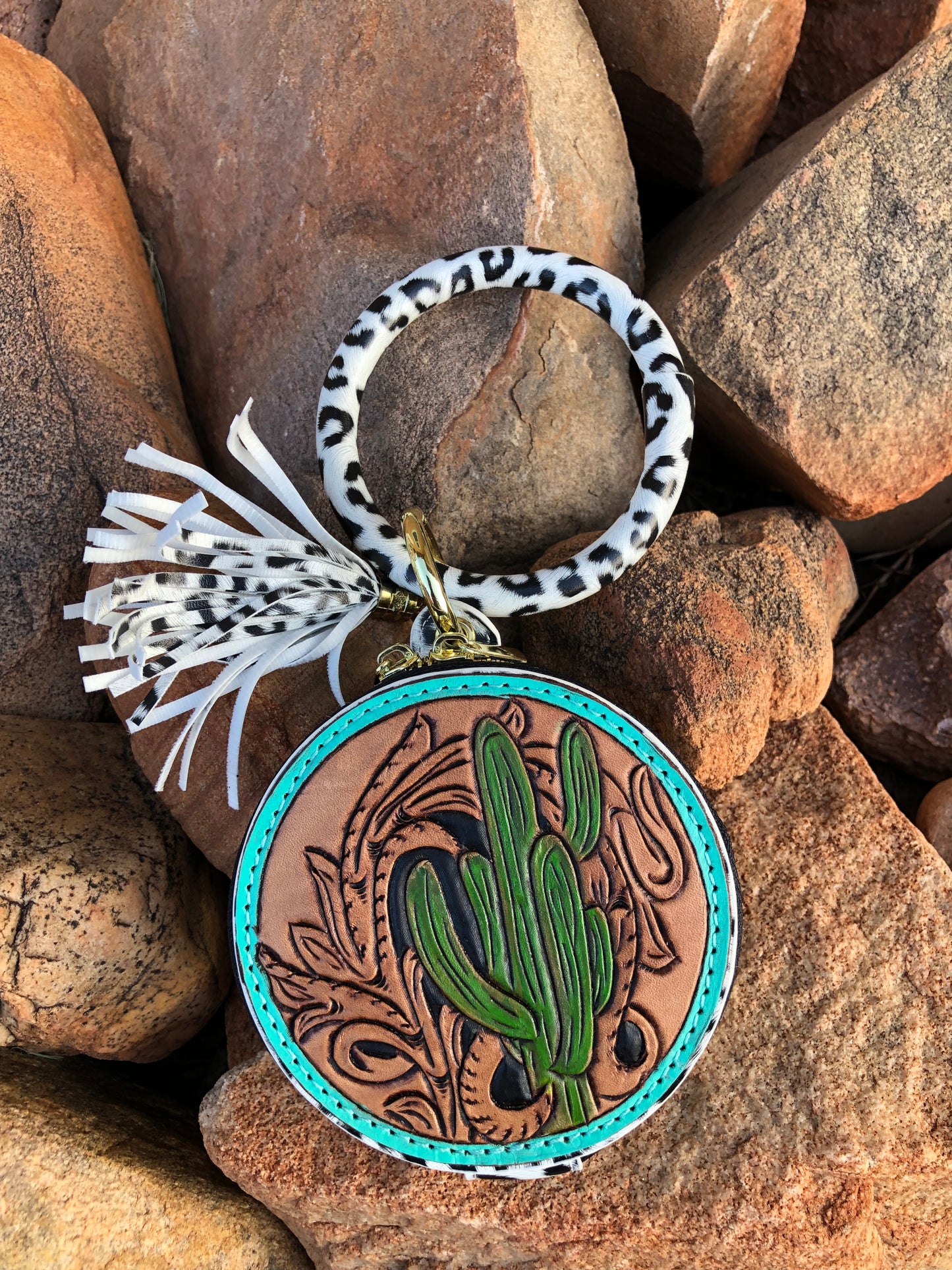 Western tooled leather cactus wristlet with mirror