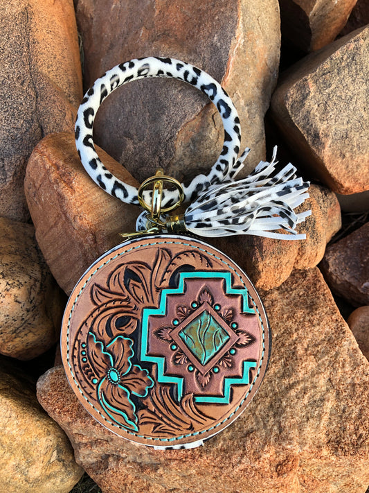 Western tooled leather floral and geometric snow leopard wristlet with mirror