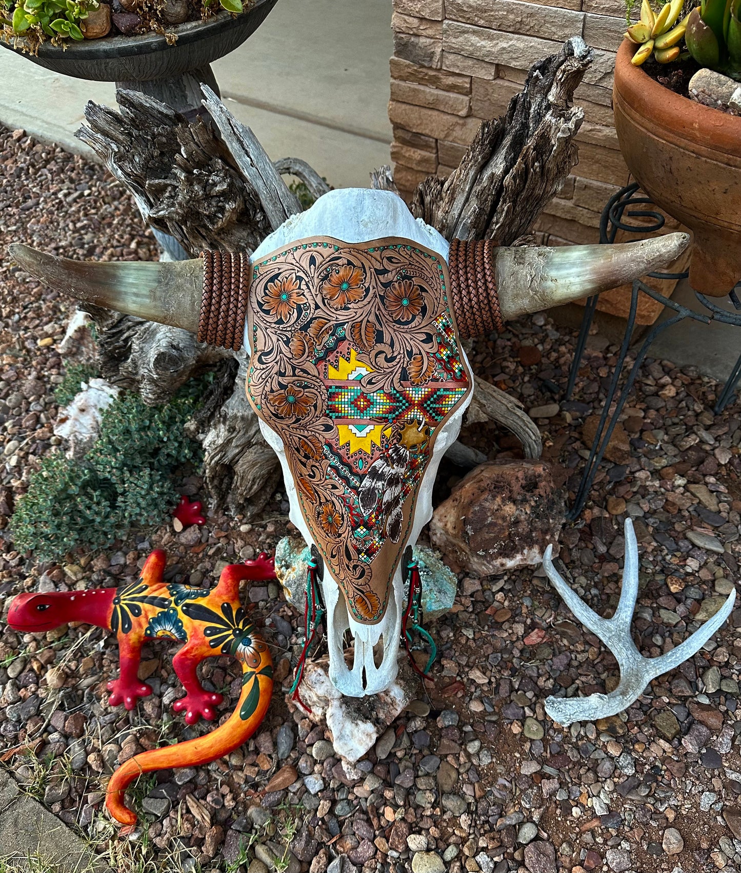 Western tooled floral and southwestern feather and faux beadwork cow skull