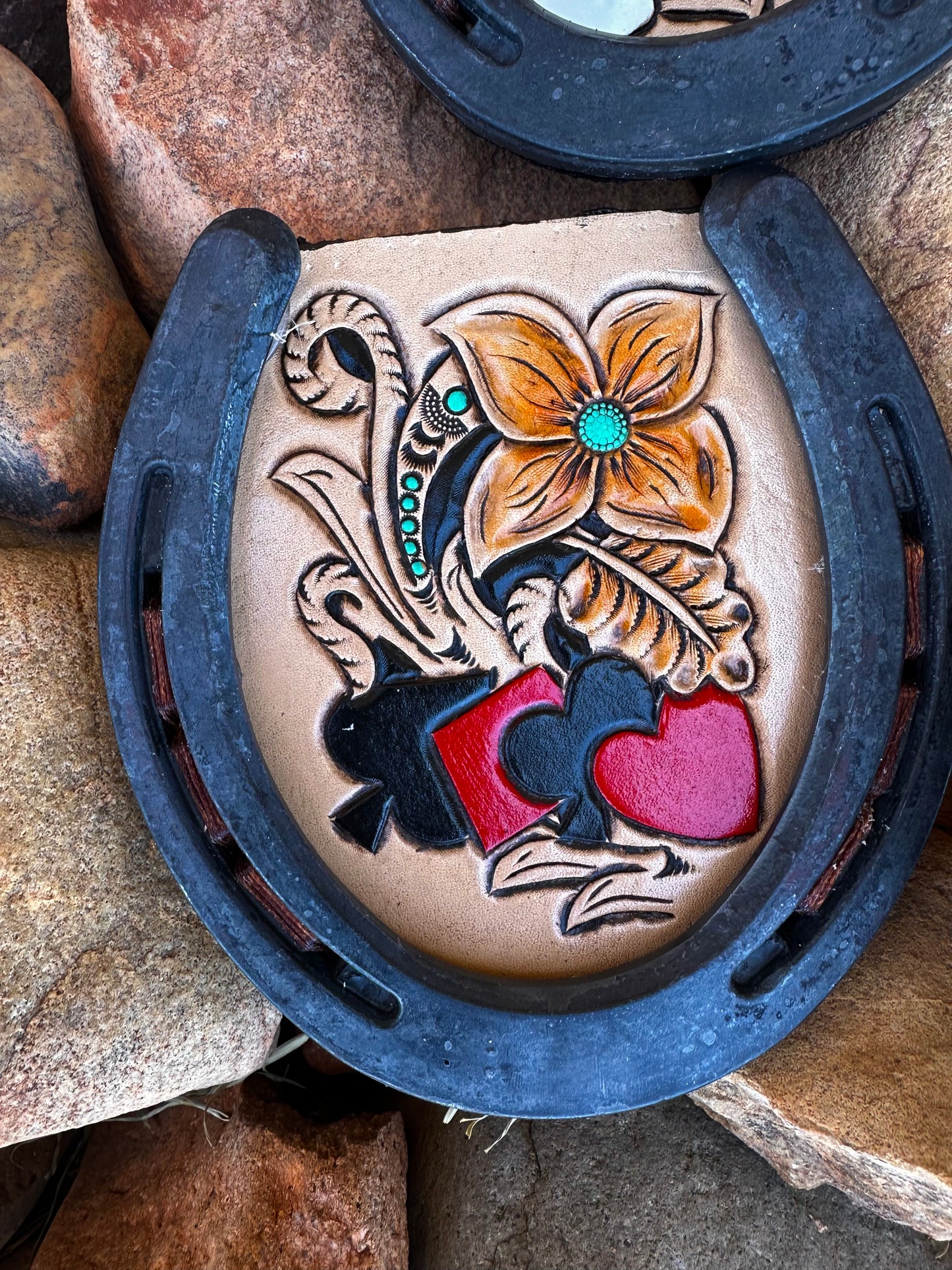 Western tooled leather cards and floral horseshoe coaster set