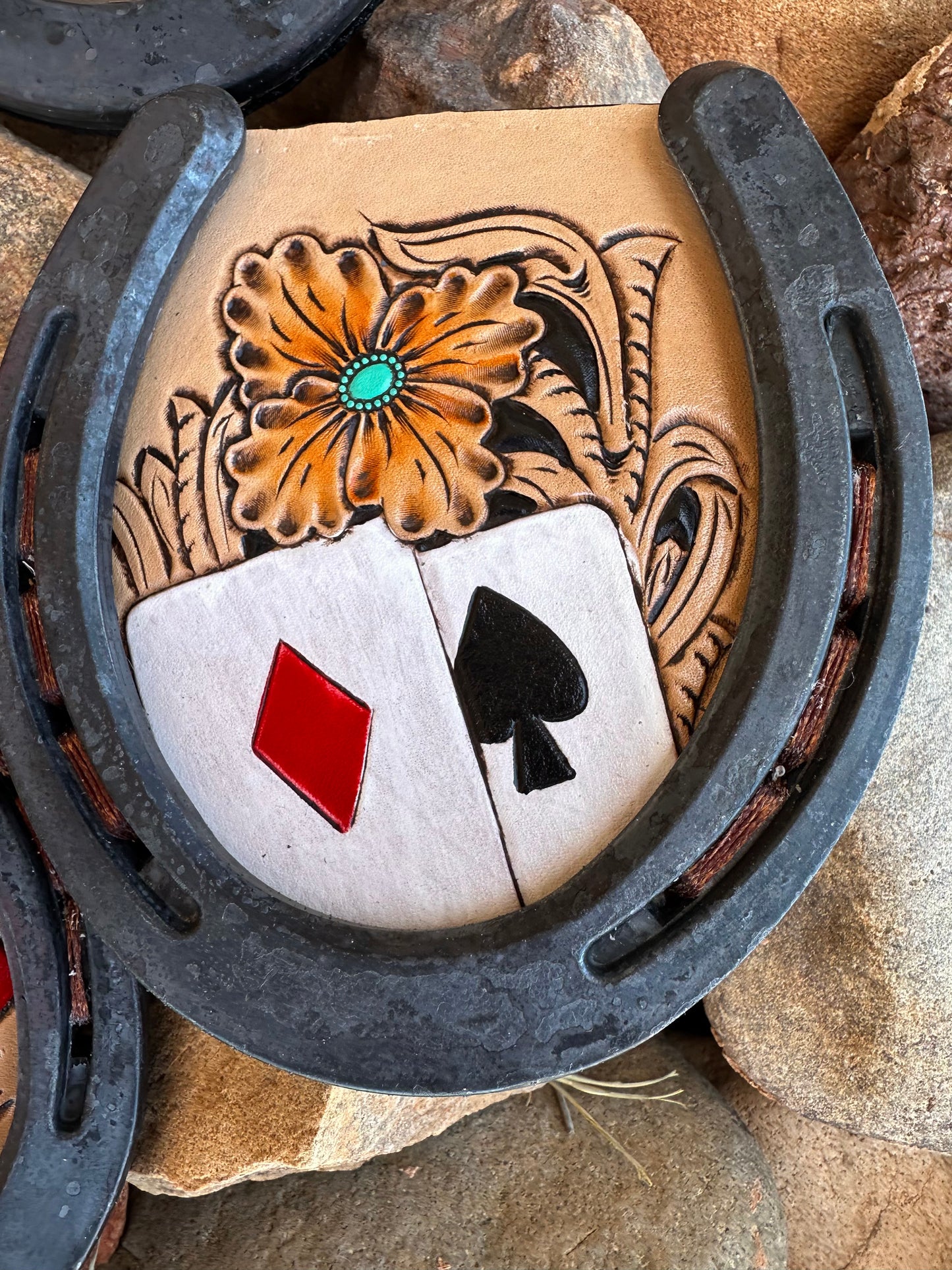 Western tooled leather cards and floral horseshoe coaster set