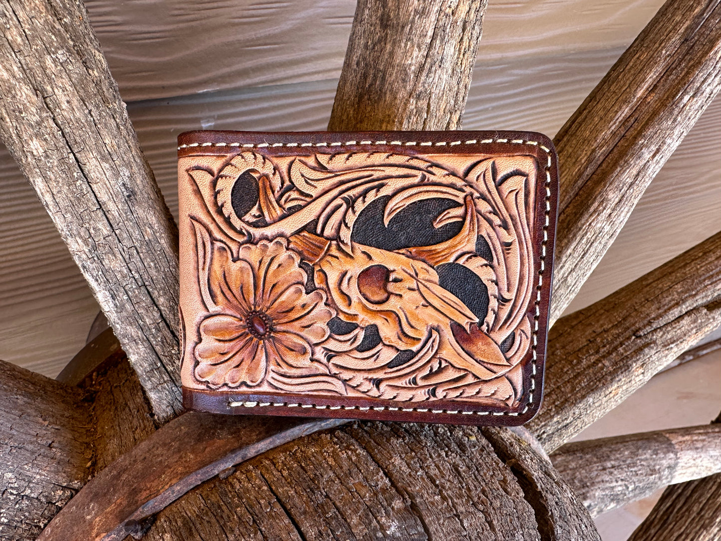 Western tooled leather cow skull and floral bifold wallet