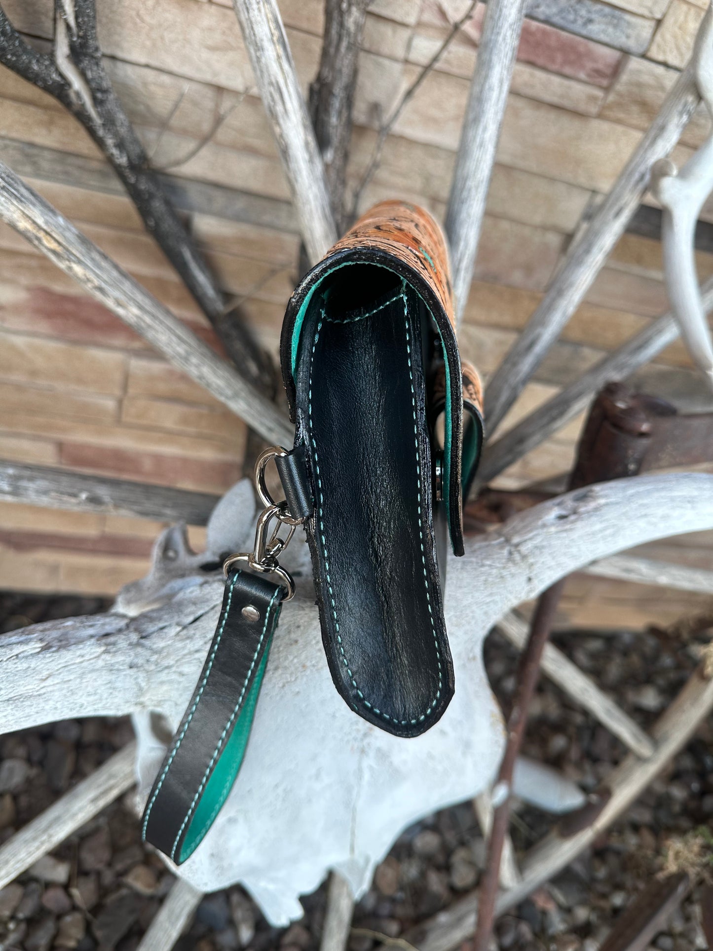Western tooled leather floral clutch