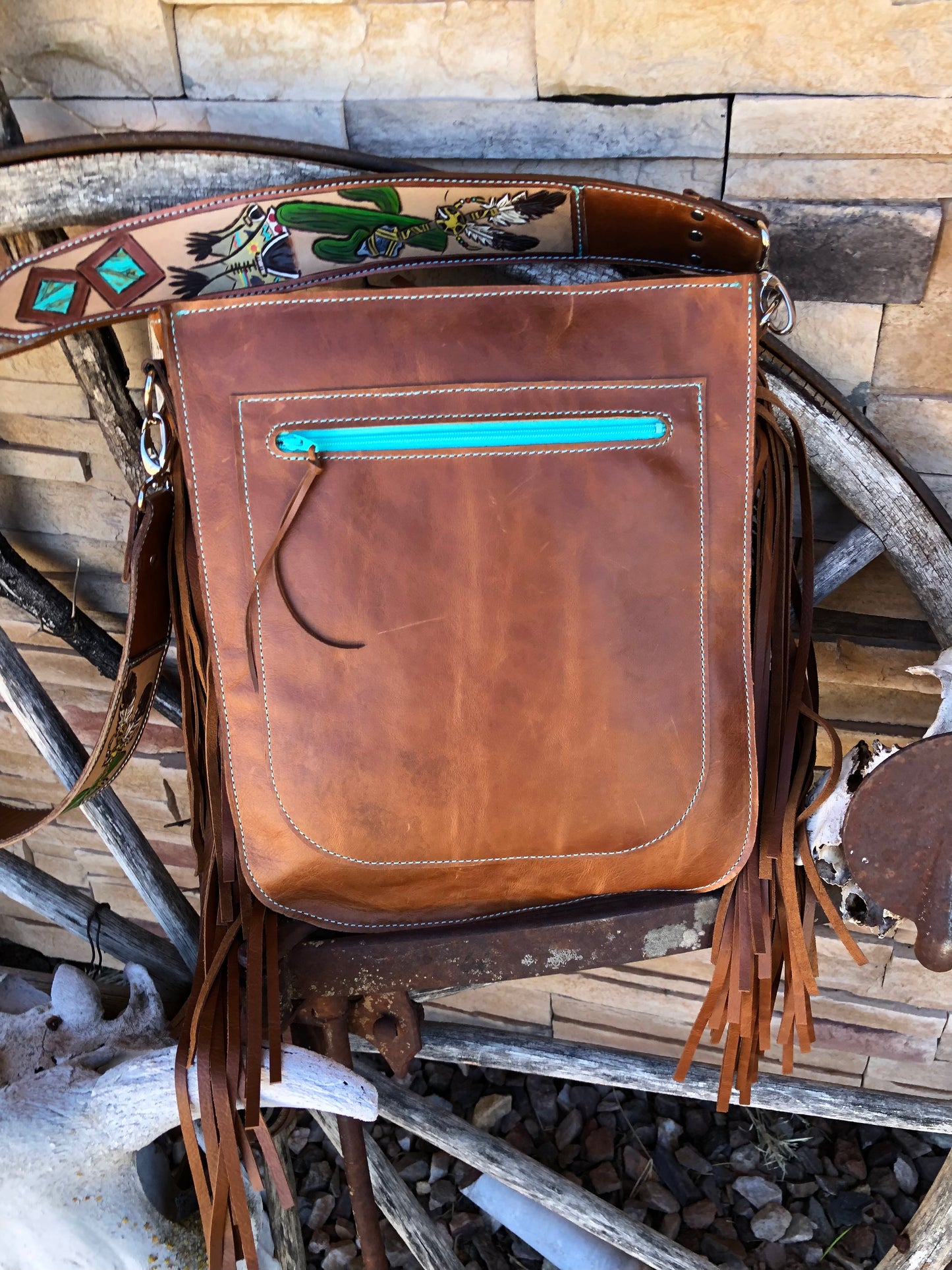 Southwestern tooled leather desert teepee fringe cowhide crossbody bag