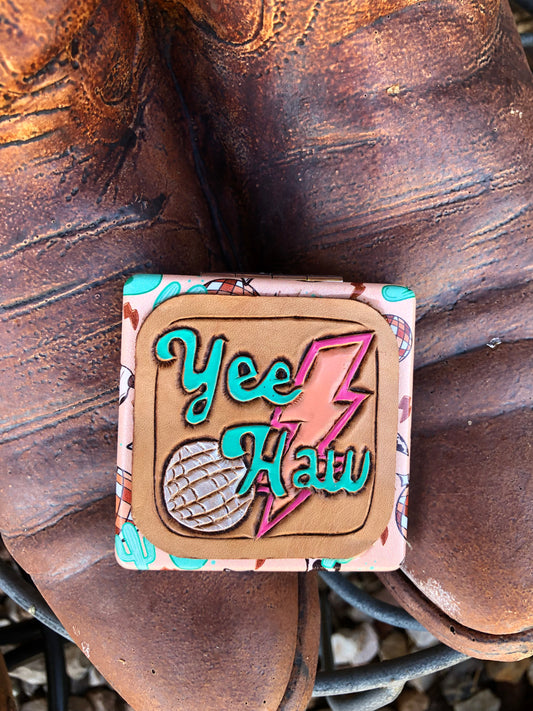 Western tooled leatherYeeHaw patch on peachy cow skull and disco ball compact