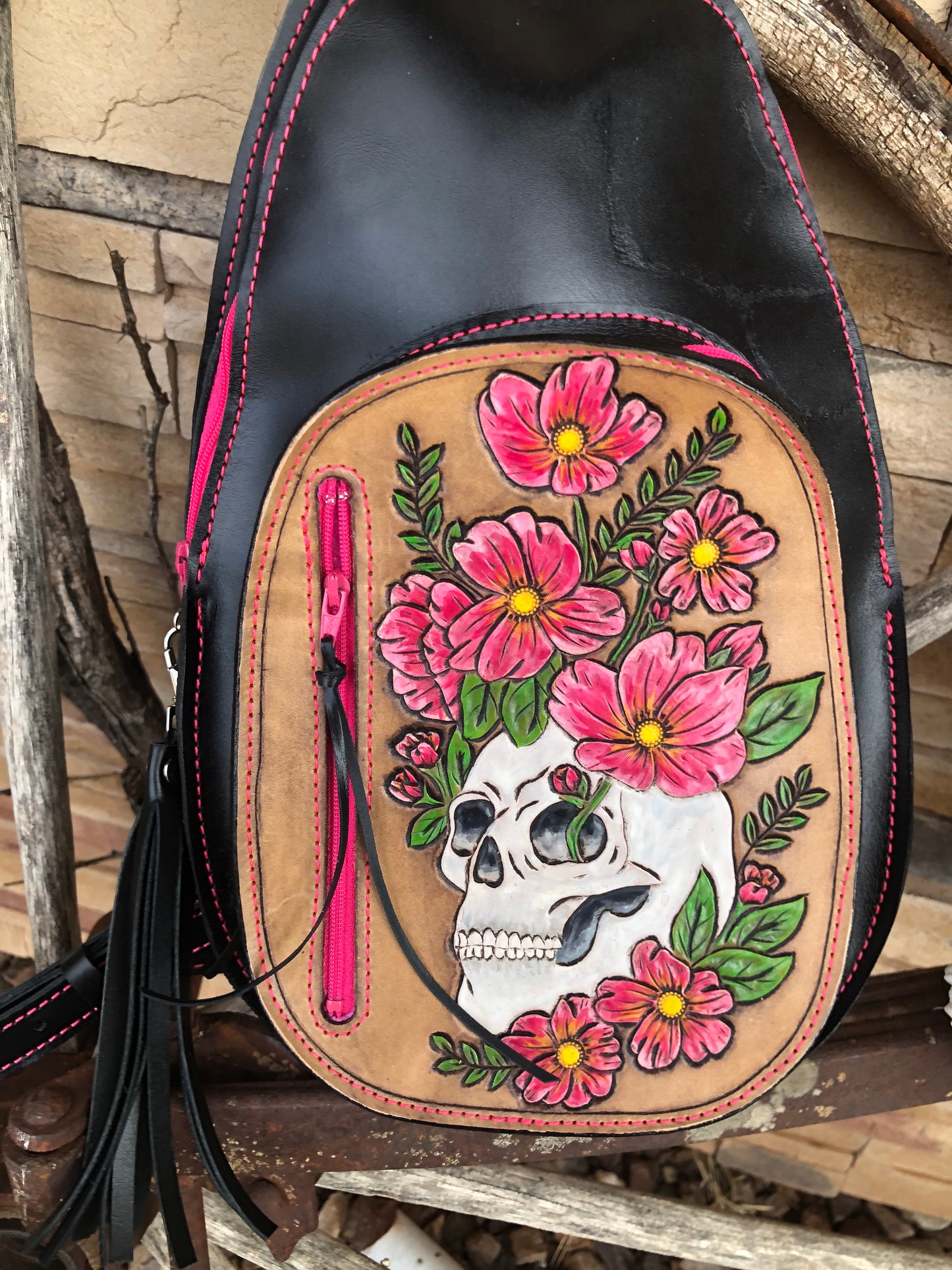 Tooled leather skull and flower sling bag