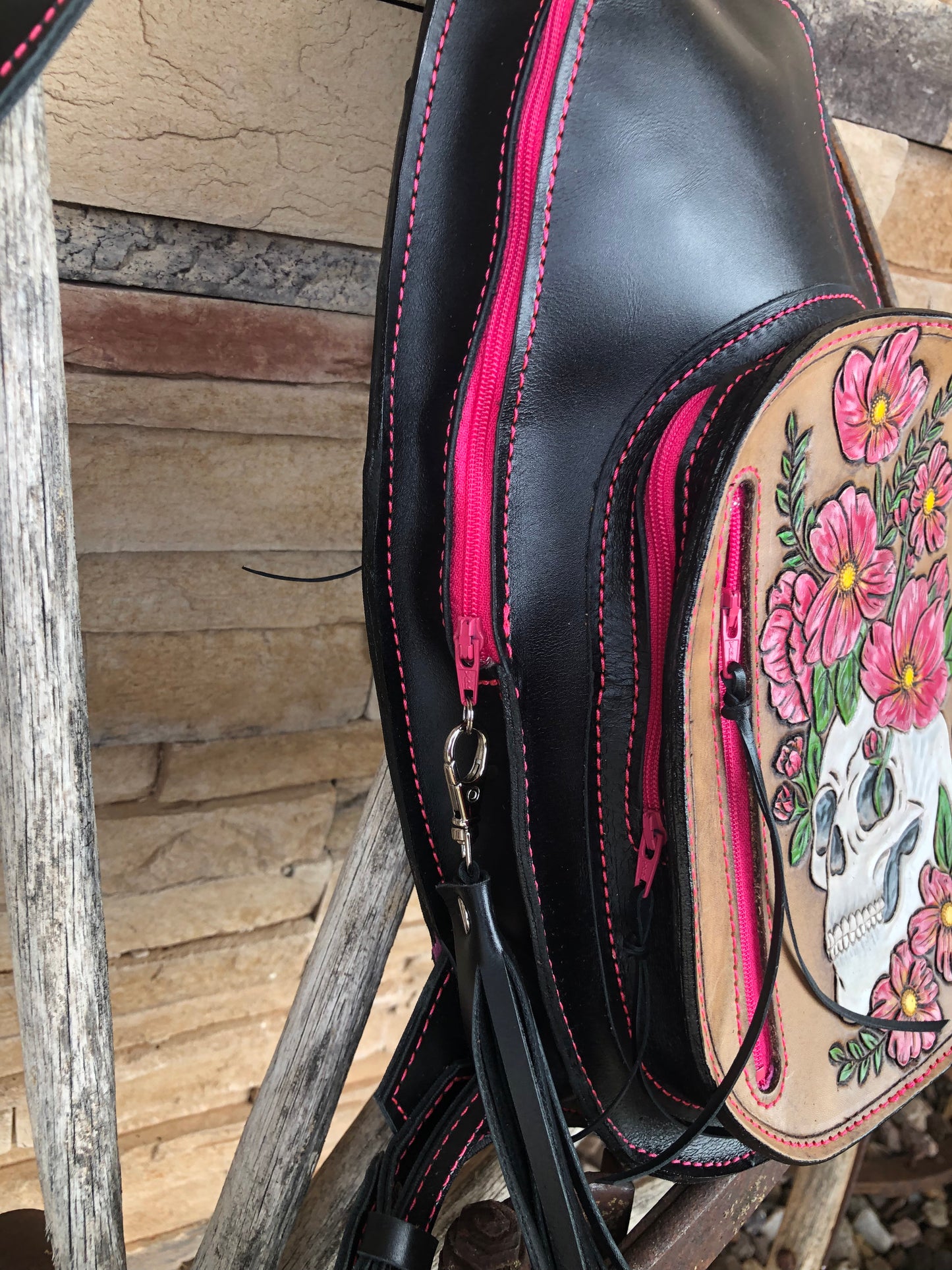 Tooled leather skull and flower sling bag