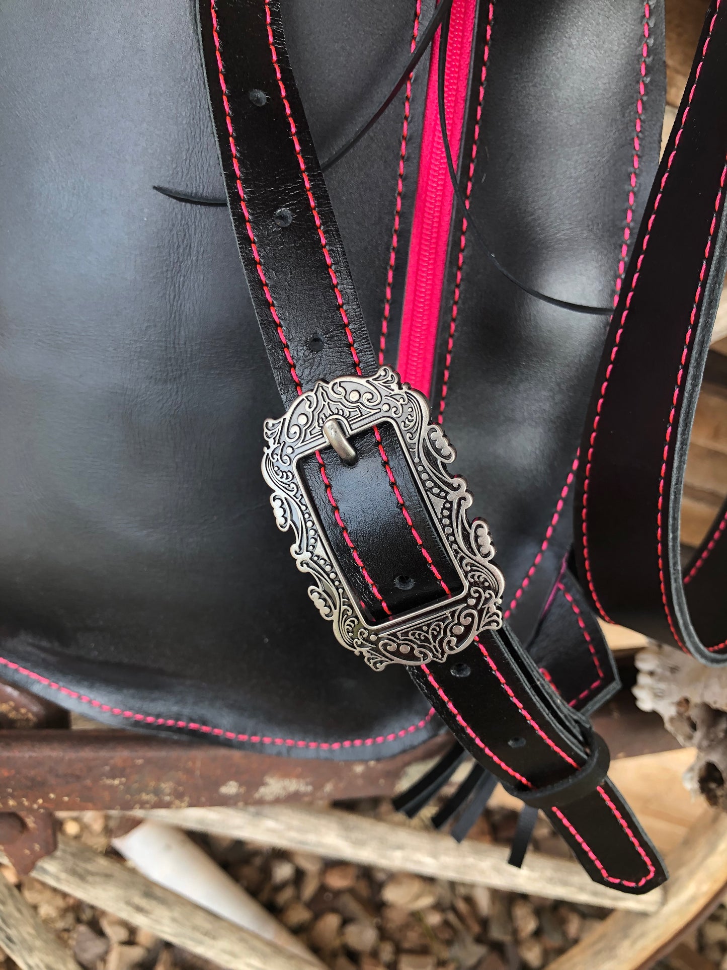 Tooled leather skull and flower sling bag