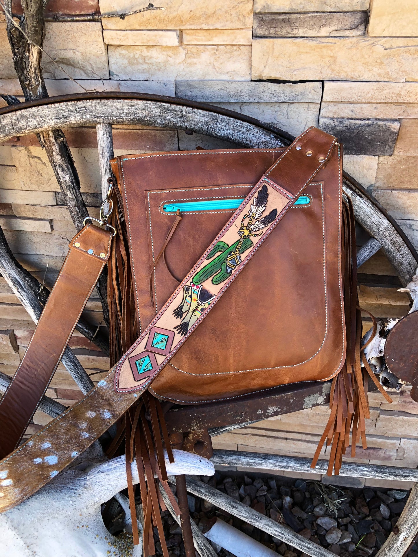 Southwestern tooled leather desert teepee fringe cowhide crossbody bag