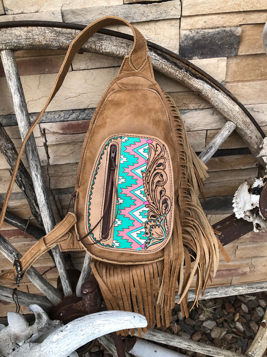 Small Southwestern tooled leather floral fringe sling bag