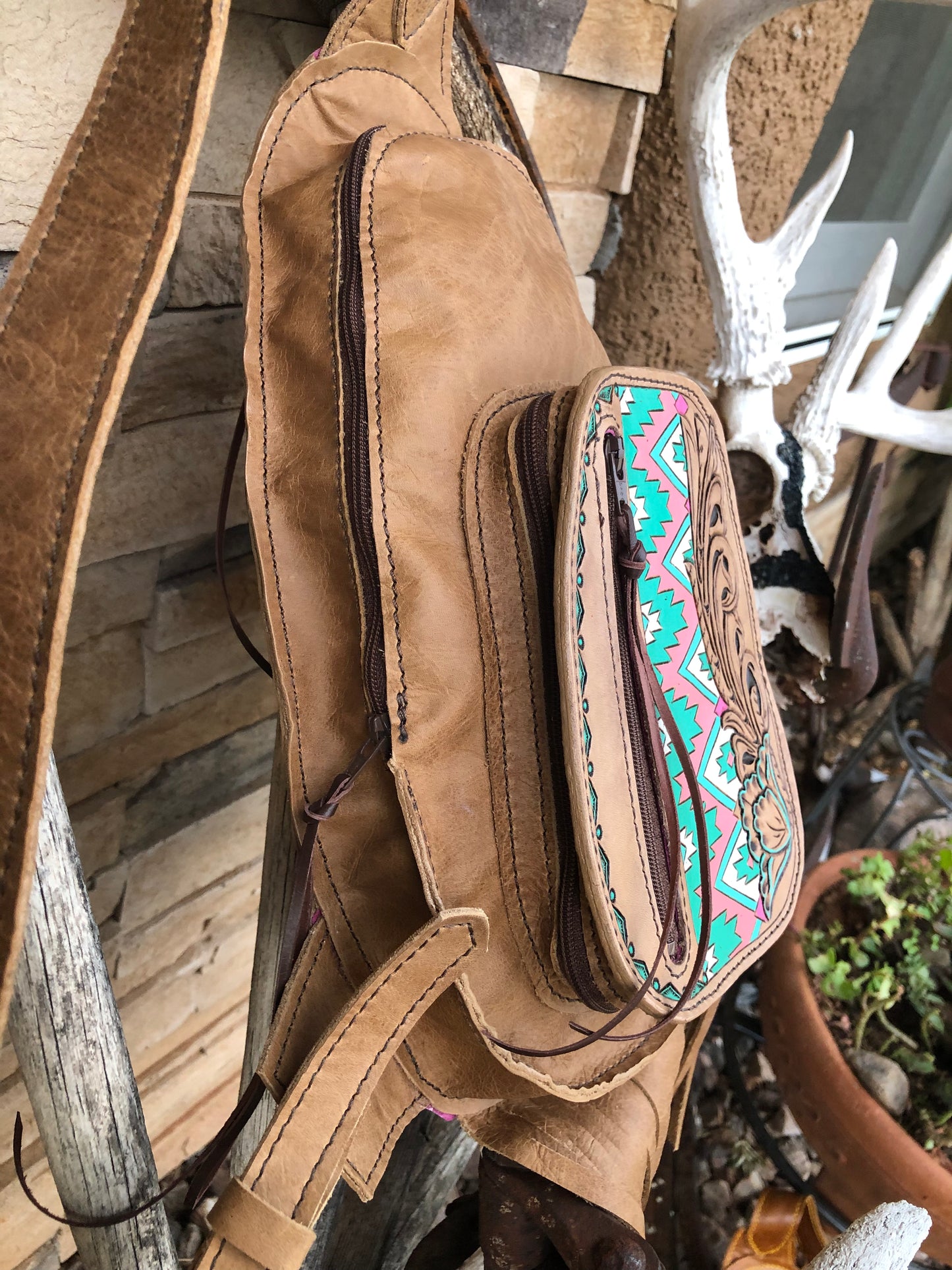 Small Southwestern tooled leather floral fringe sling bag