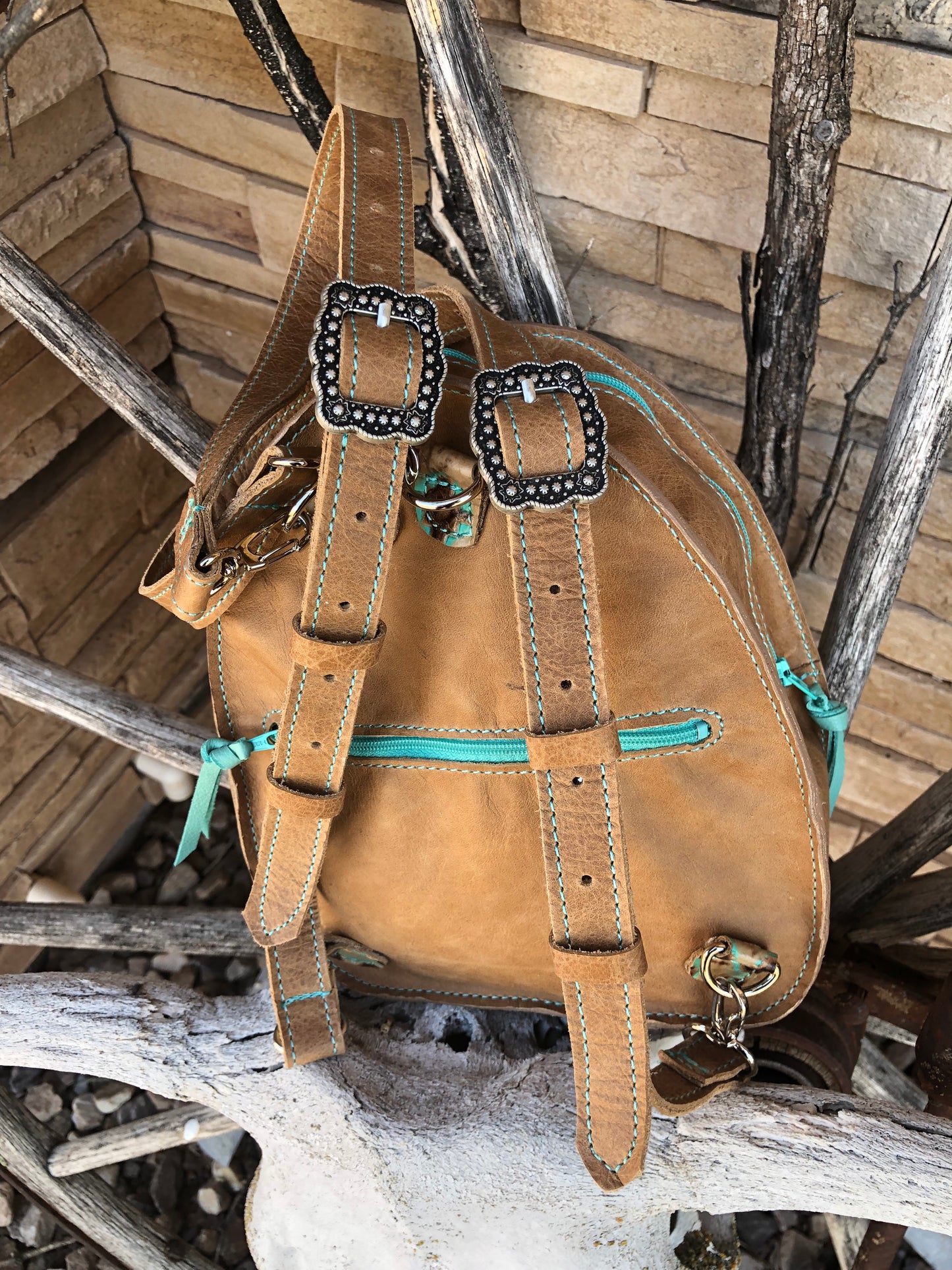 Southwestern tooled leather thunderbird patch backpack purse.