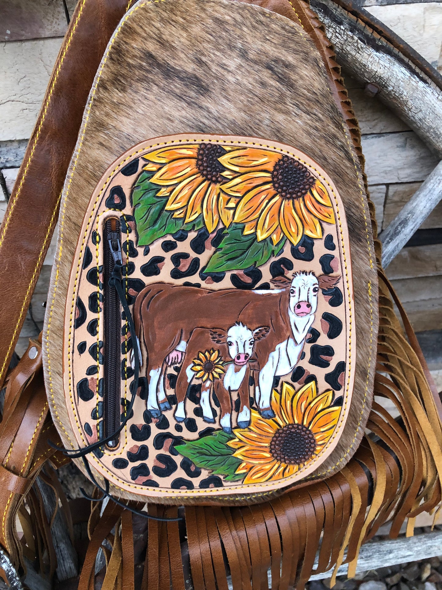 Western tooled leather Hereford sunflower and leopard print fringe sling bag