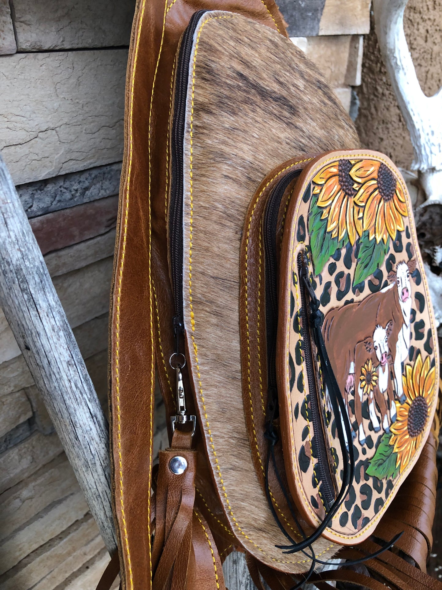 Western tooled leather Hereford sunflower and leopard print fringe sling bag